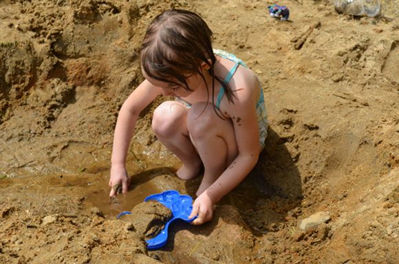 Child Barefoot in the Sand