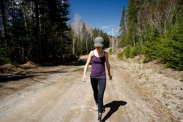 girl walking on road